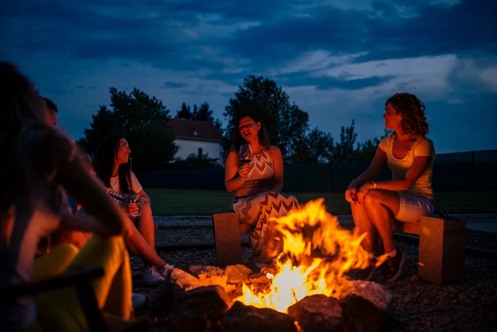 friends around the fire pit at a Sevierville TN cabin